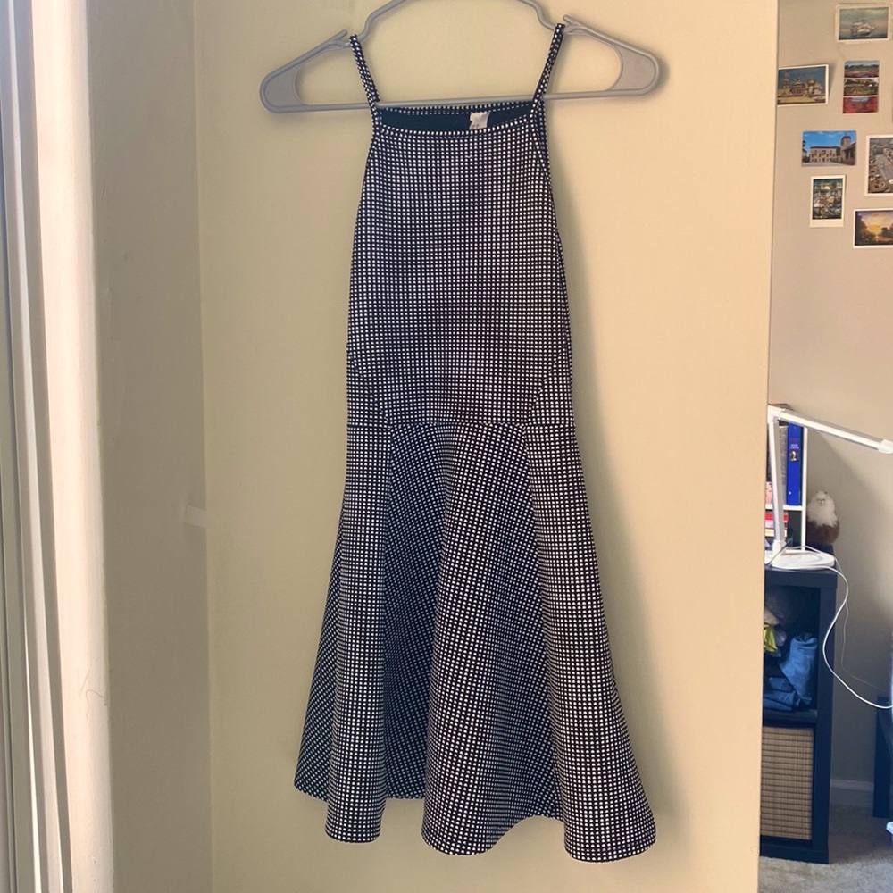 Black mini dress with white polka dots